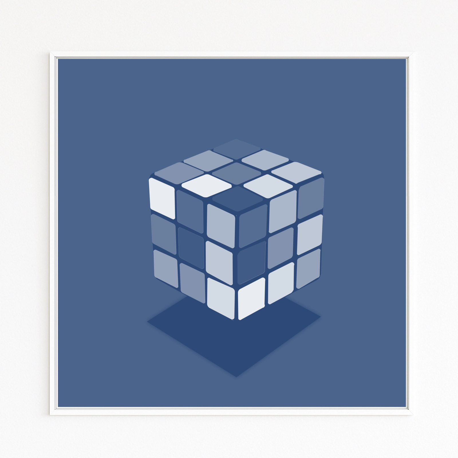 CUBE shows a floating Rubik's Cube in finely graded blue tones. Soft edges, light-like tiles, and a deep shadow enhance lightness and rotation—between toy icon and sculpture.