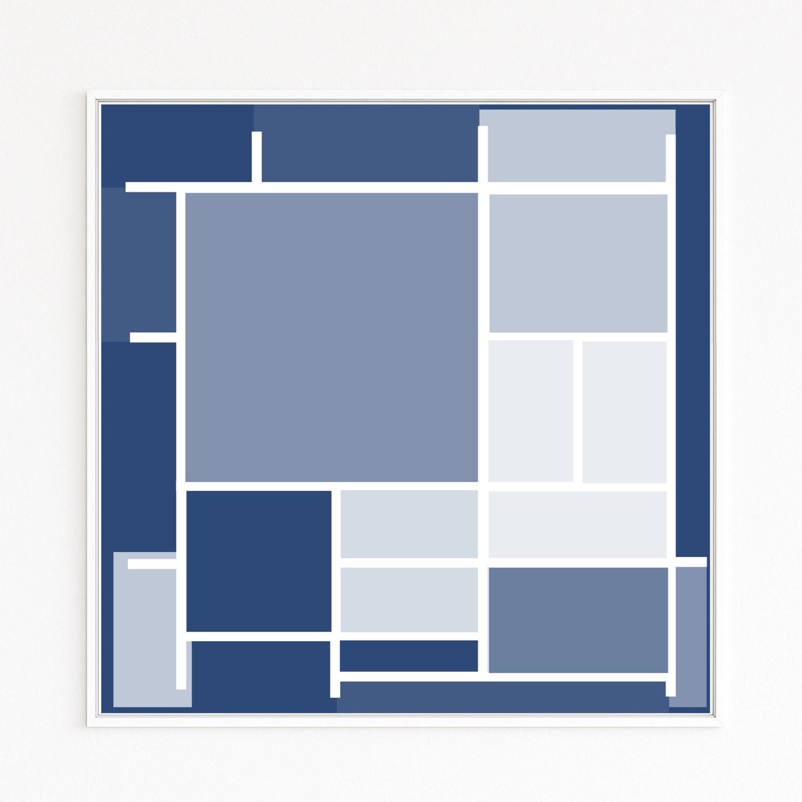 MONDRIAN INSPIRED Rectangles and squares in blue tones, separated by white lines, form a harmonious composition. Cool, monochrome palette. Classic abstraction, modernized—timeless and structured.