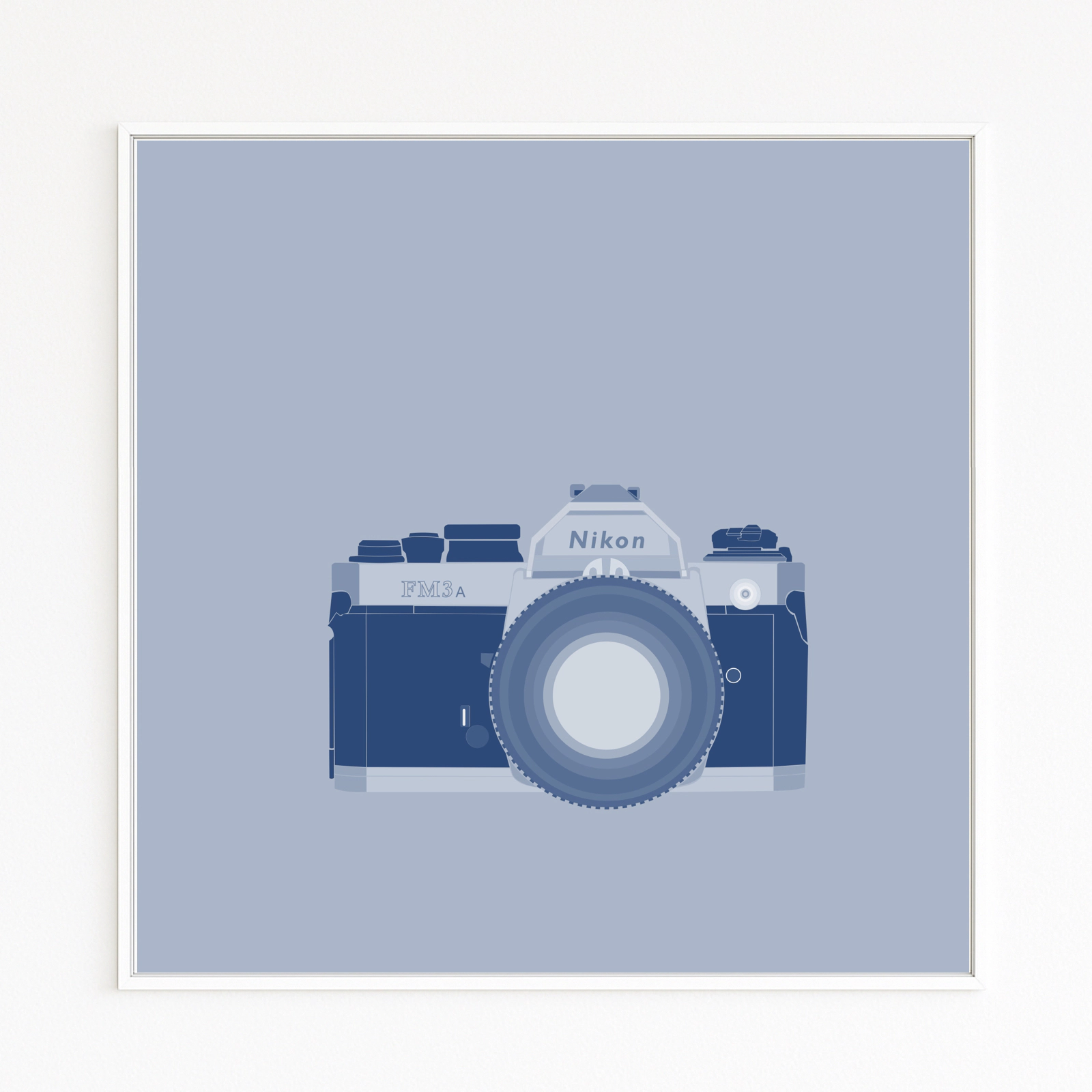 NIKON: classic FM3A SLR in blue tones, with prism housing, shutter-speed dial, and knurled lens ring — minimalist and reduced.