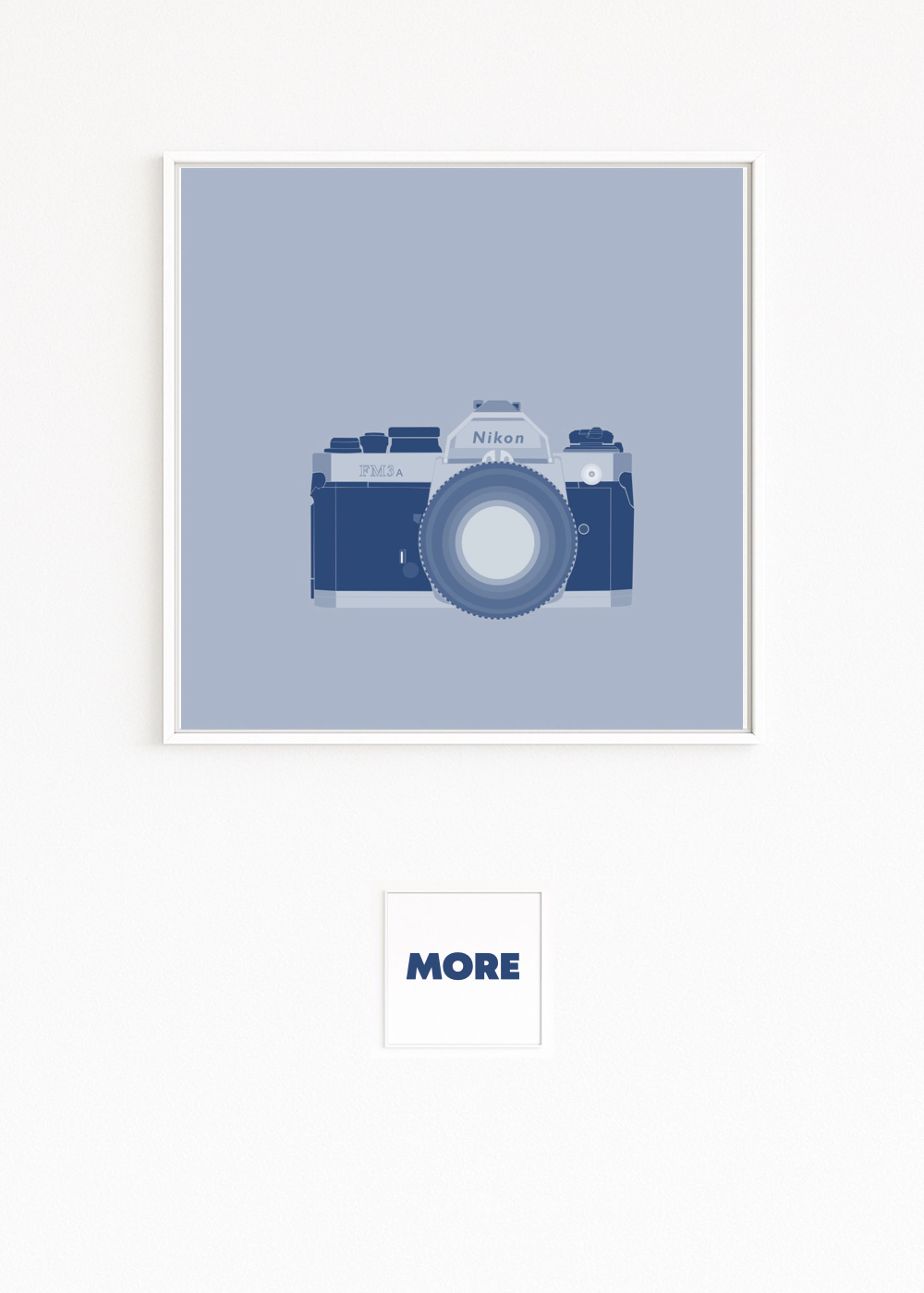 NIKON: classic FM3A SLR in blue tones, with prism housing, shutter-speed dial, and knurled lens ring — minimalist and reduced.