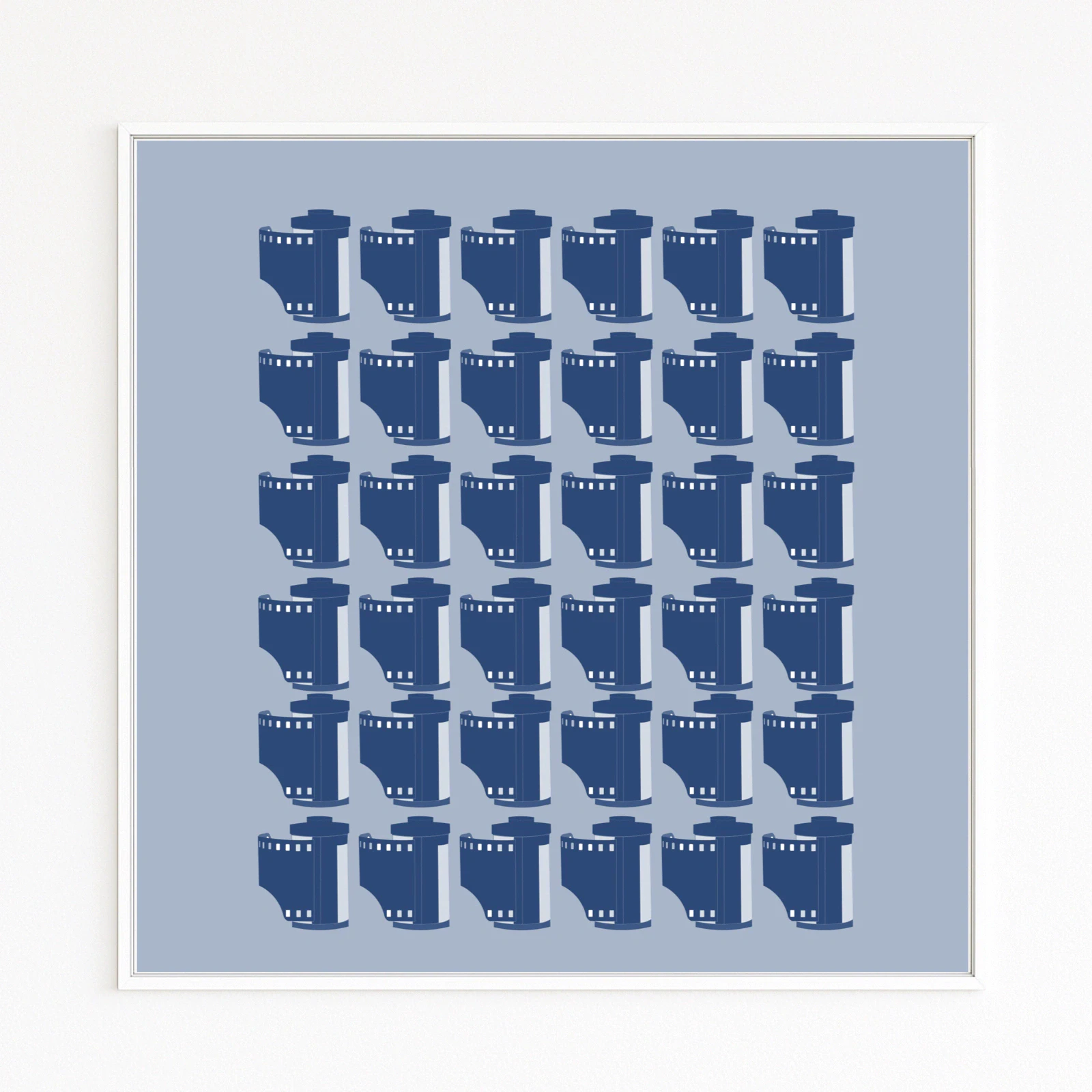FILM presents 25 iconic 35 mm film cartridges in a 5×5 grid in rich blue tones—evoking pop art and paying homage to analog photography. Buy directly from the artist: Hahnemühle Fine Art,